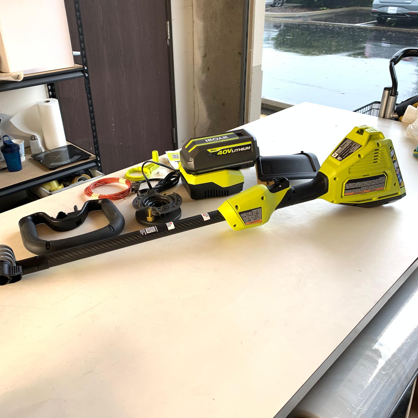 40V HP Brushless 16 in. Cordless Carbon Fiber Shaft Attachment Capable String Trimmer with 4.0 Ah Battery and Charger (RY40HPST01K) 40V HP Brushless 16 in. Cordless Carbon Fiber Shaft Attachment Capable String Trimmer with 4.0 Ah Battery and Charger (RY40HPST01K)